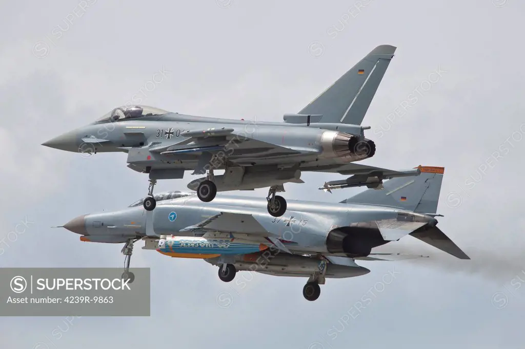 Eurofighter Typhoon and its precedessor, the F-4F Phantom, of the German Air Force, in flight over Manching, Germany.