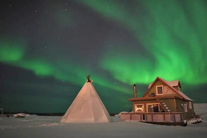 Northern Lights above village, Northwest Territories, Canada.