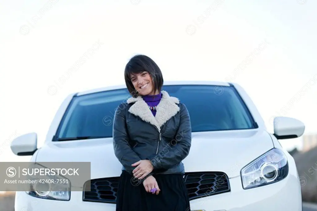 Beautiful Woman Next To Her New White Car