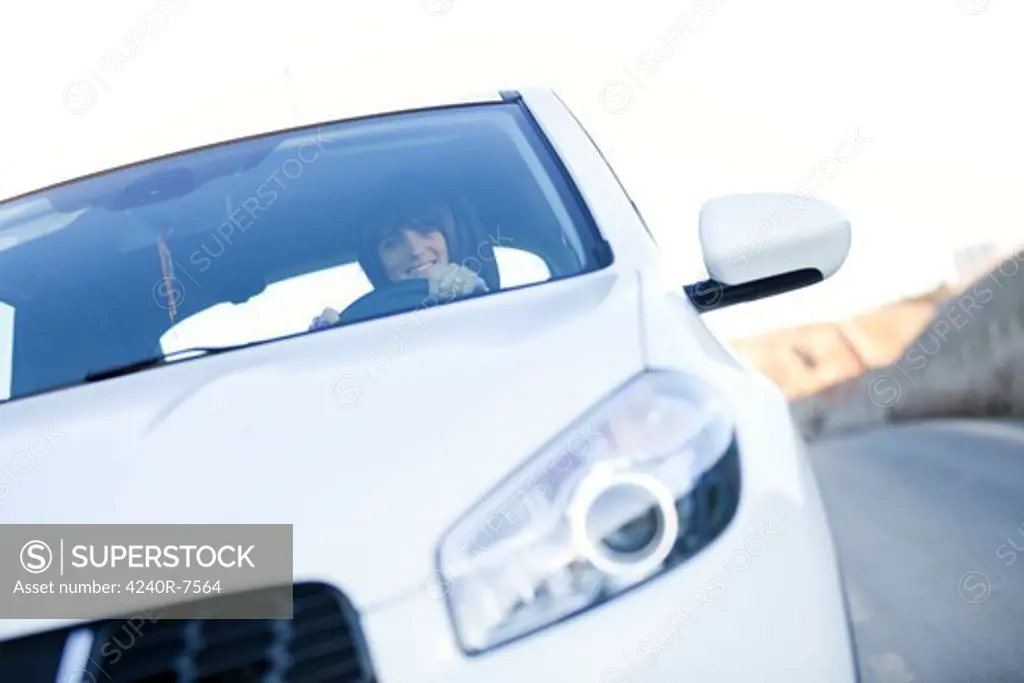 Beautiful Woman Driving Her New White Car