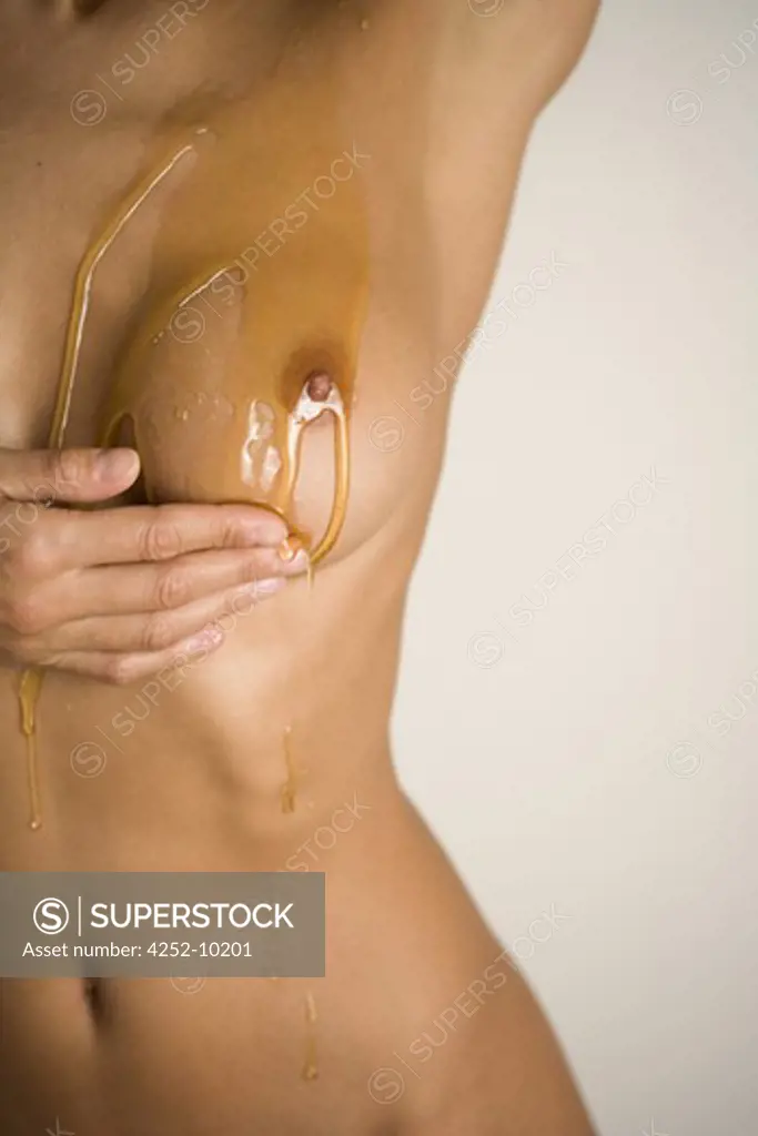 Woman moisturizing oil