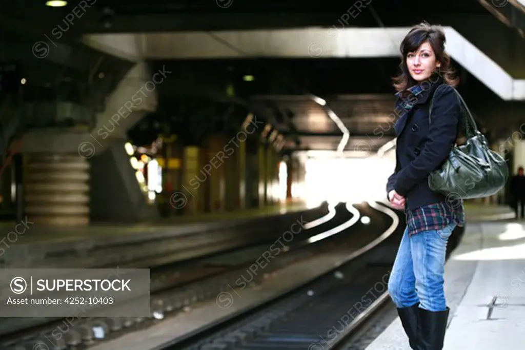 Woman waiting subway