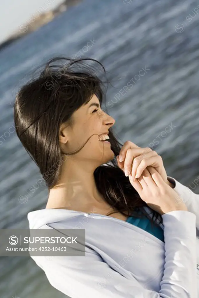 Woman laugh beach