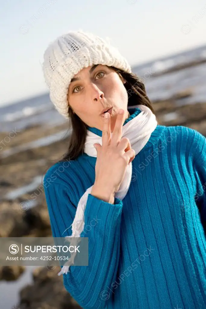Woman smoking gesture