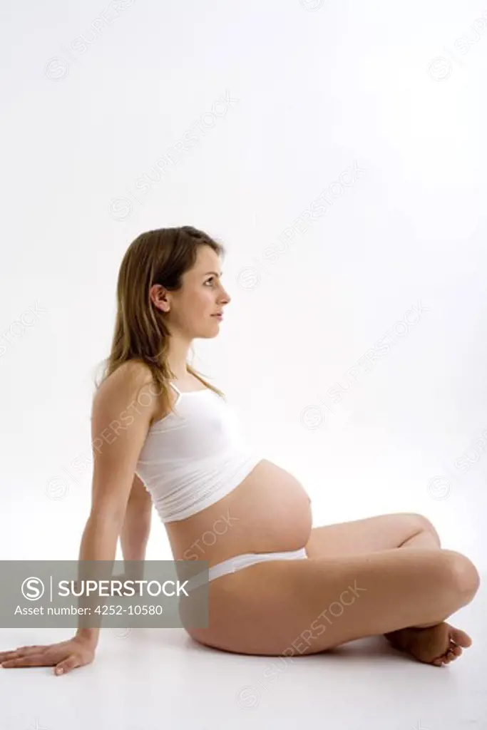 Contemplative pregnant woman