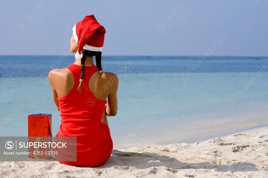Woman christmas beach