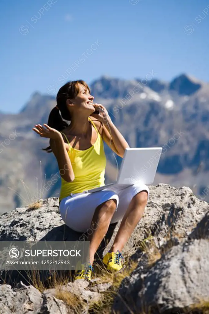 Woman mountain computer.