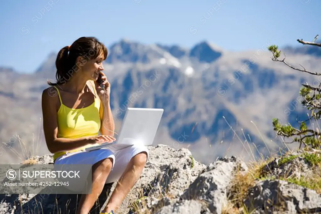 Woman mountain computer.
