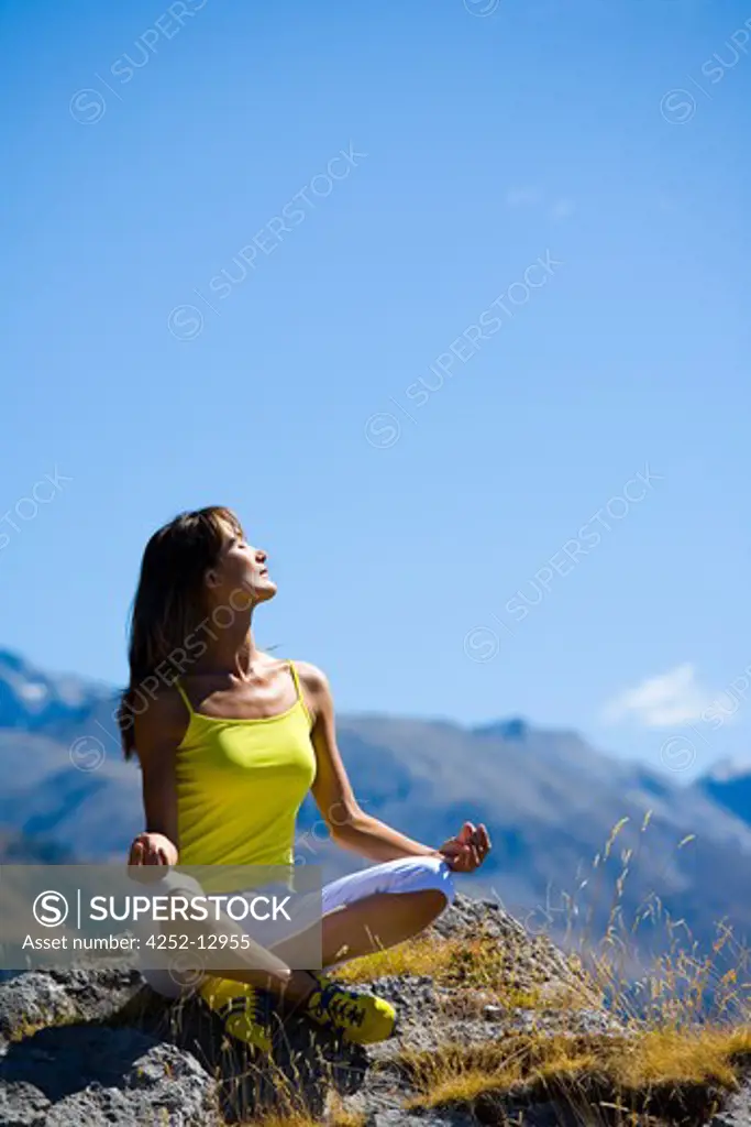 Woman yoga mountain.