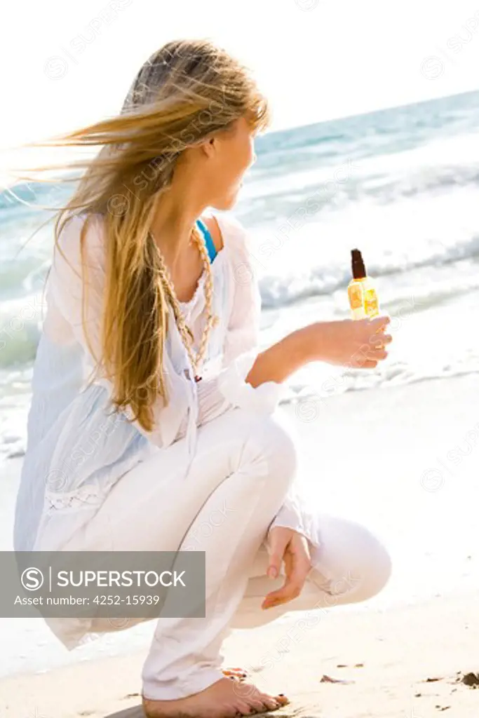 Woman haircare beach