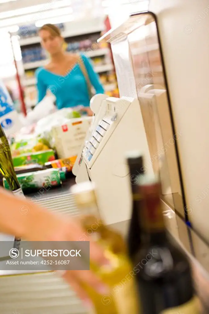Woman supermarket check out