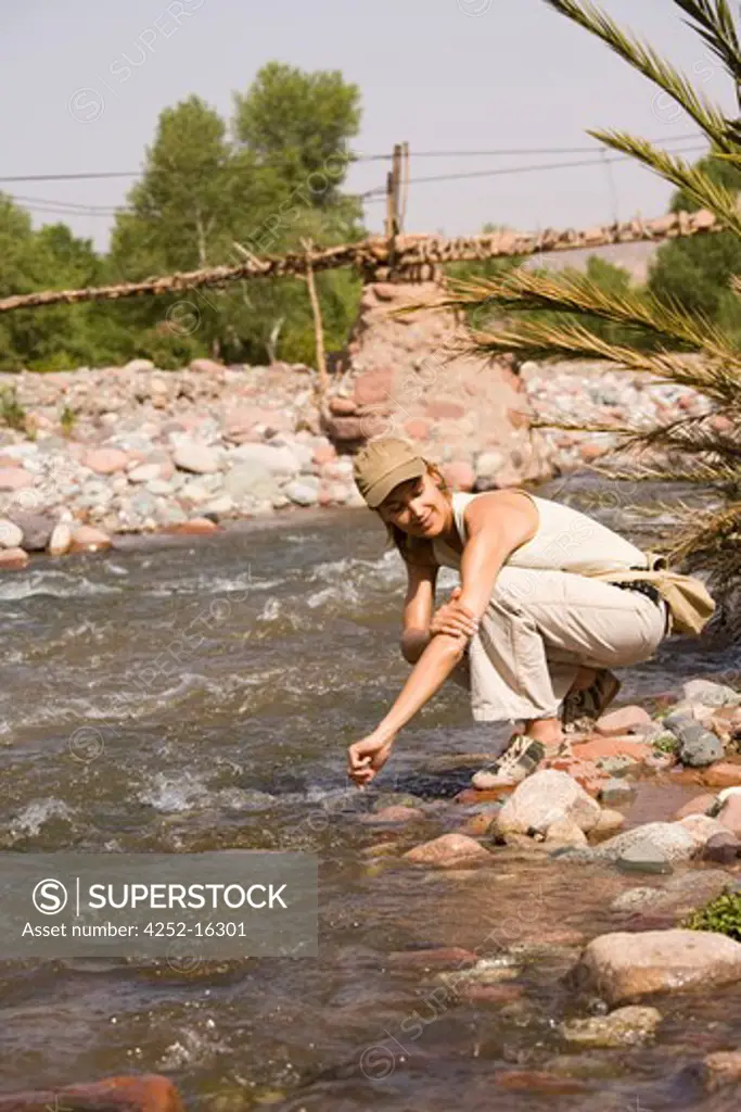 Woman river Marocco