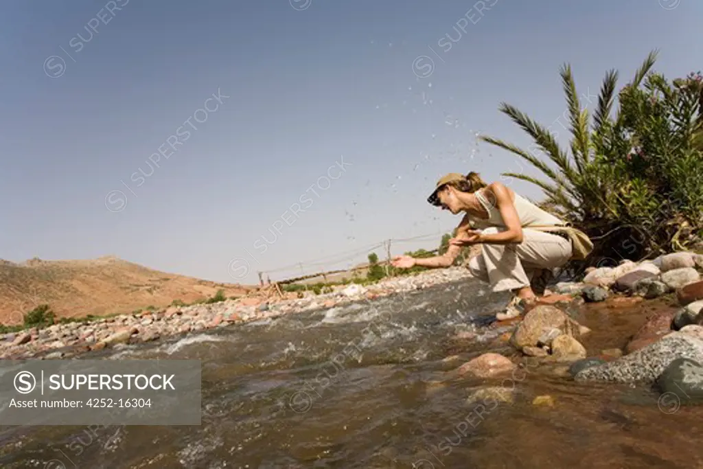 Woman river Marocco