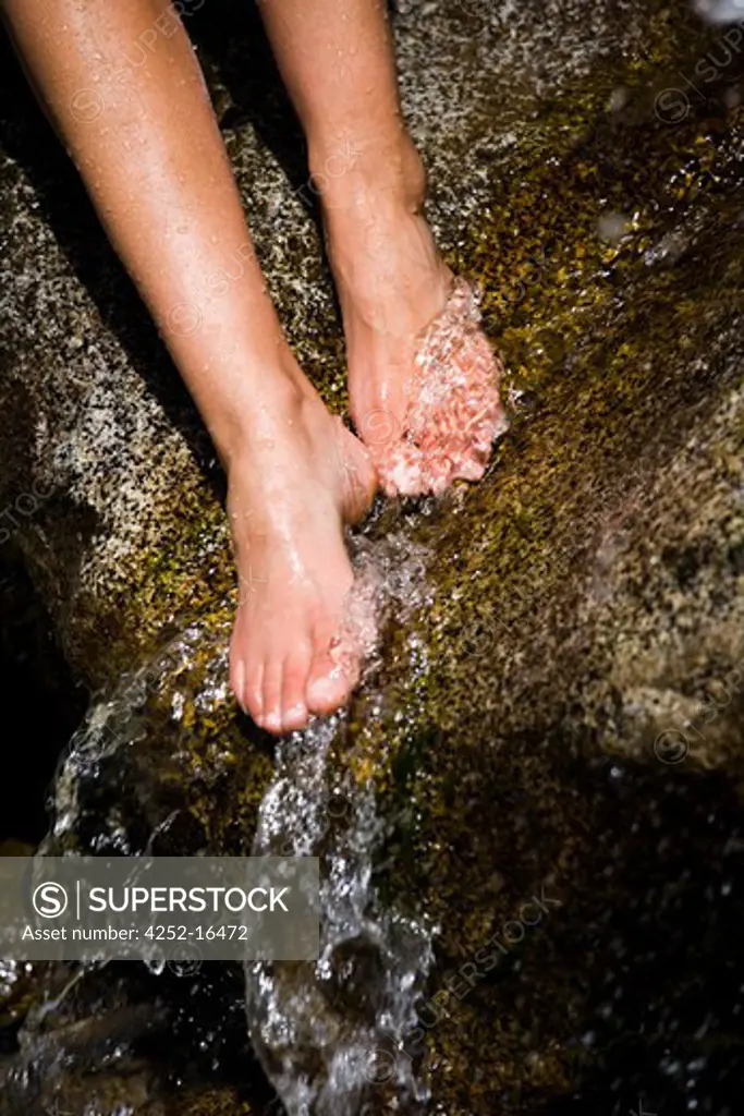 Woman feet rock