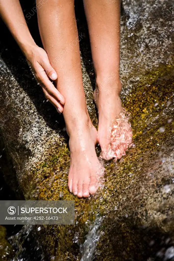 Woman feet rock
