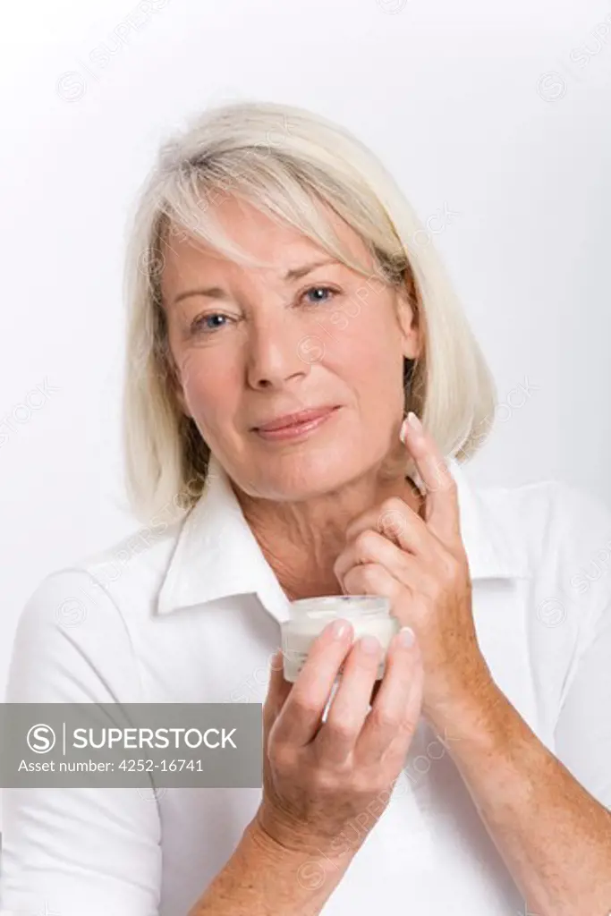 Woman moisturizing cream