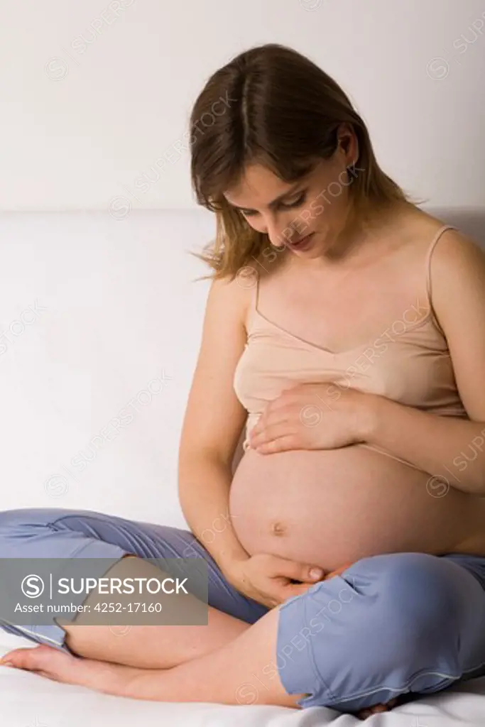 Contemplative pregnant woman