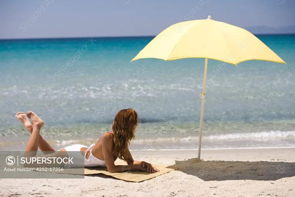 Woman beach suntanning