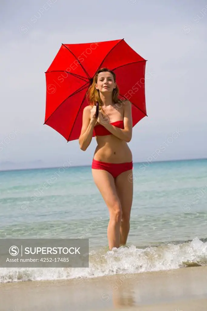 Woman sea umbrella