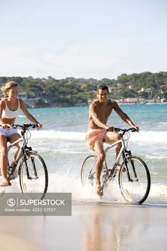 Couple beach bike