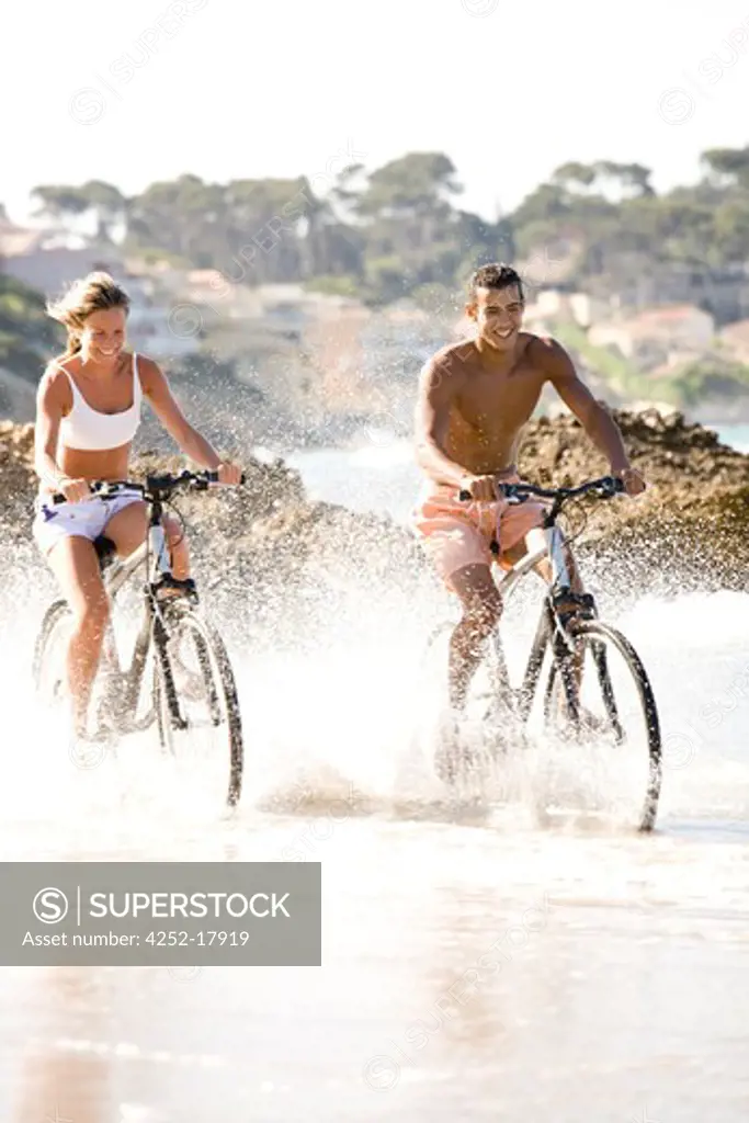 Couple beach bike