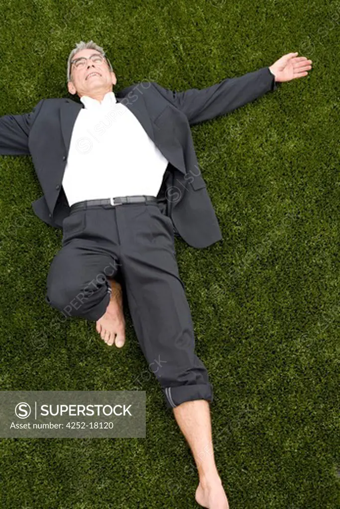 Man relaxing grass