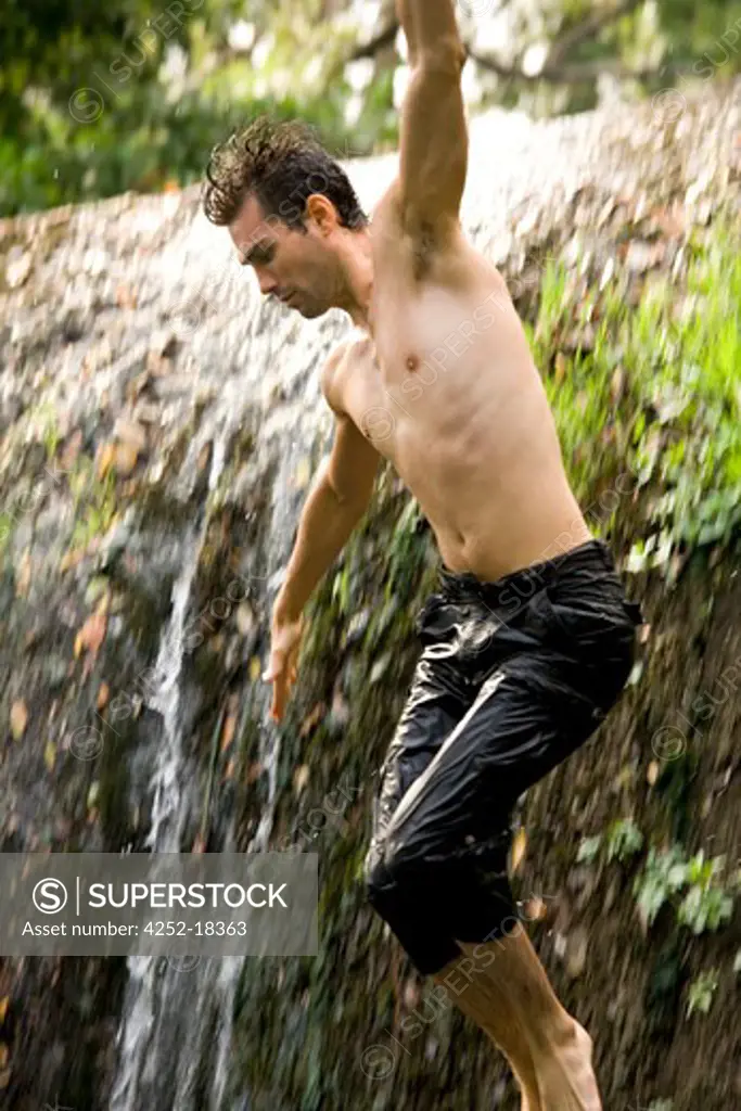 Man waterfall jump