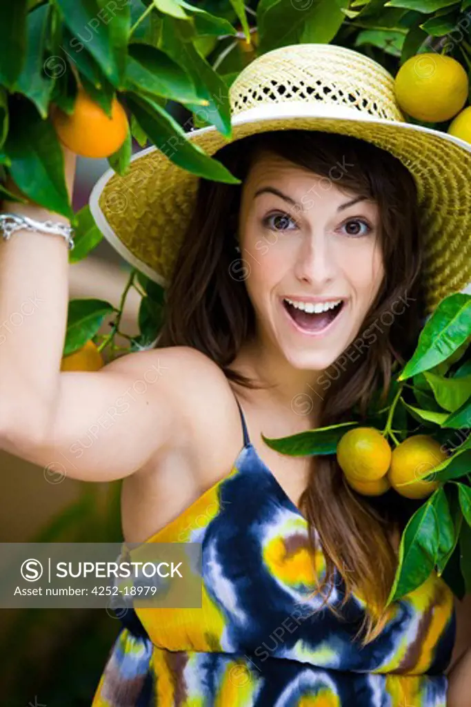 Woman summer orange tree