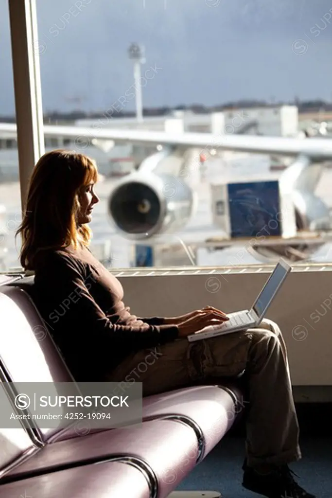 Woman airport wait