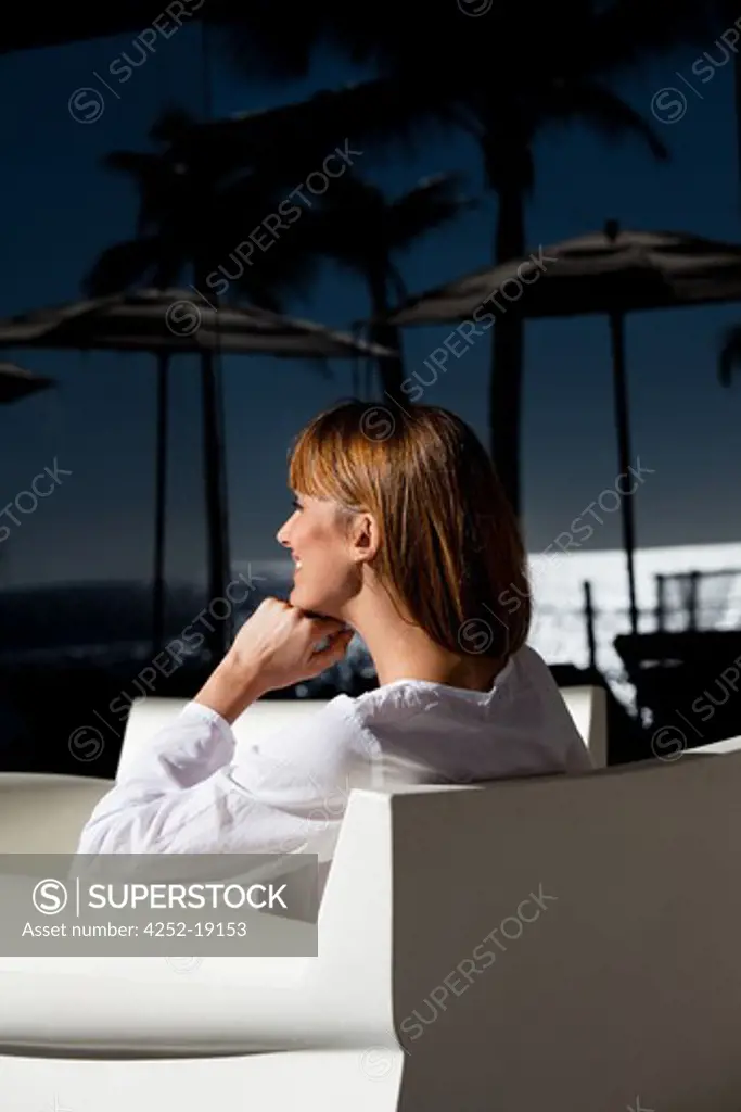 Woman armchair terrace
