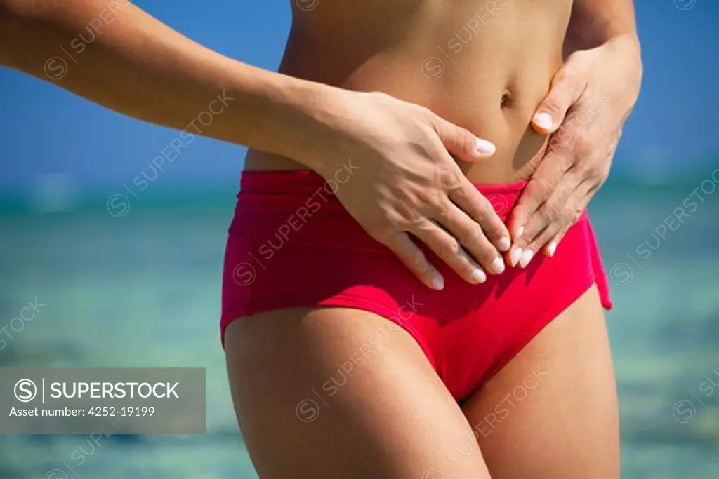 Woman hands belly