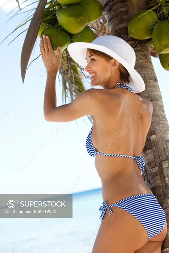 Woman beach coconut