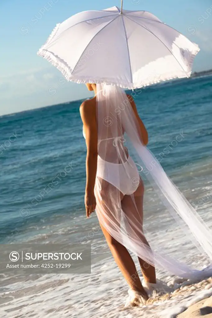 Woman beach sunshade