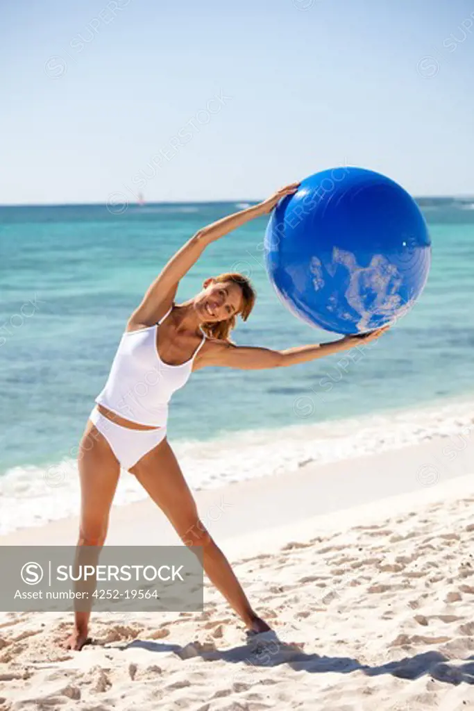 Woman ball gym beach