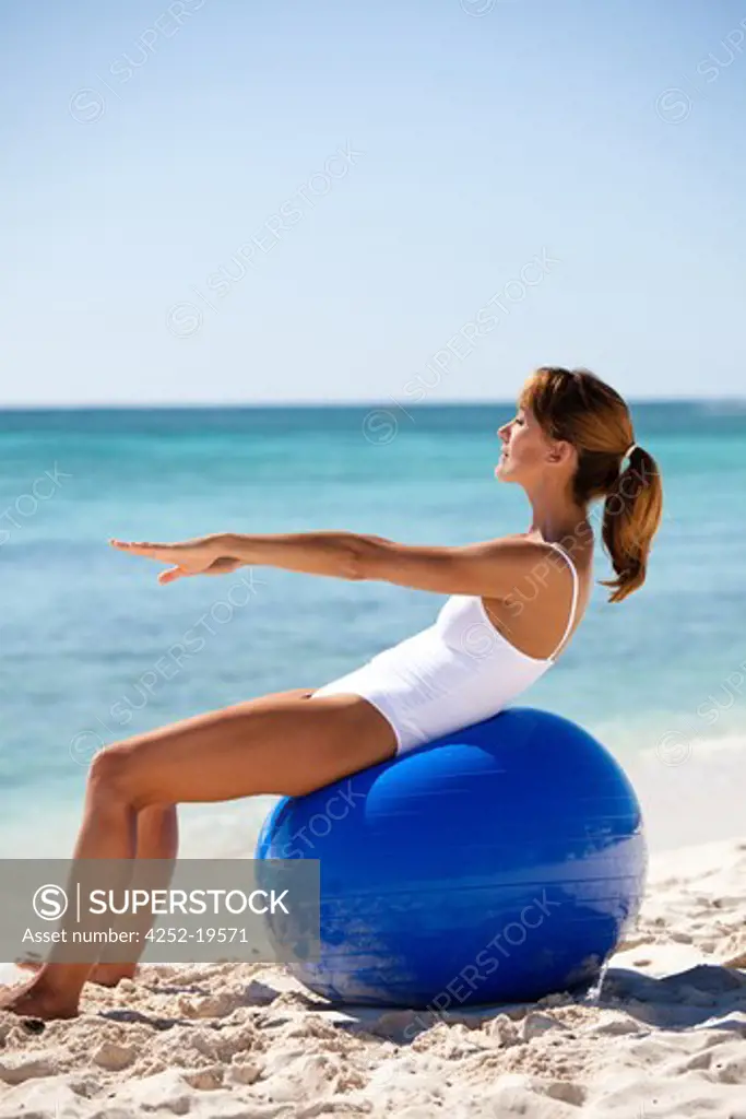 Woman beach ball gym