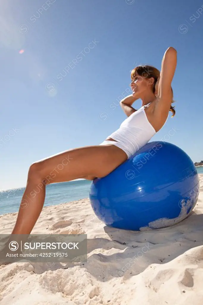 Woman beach ball gym