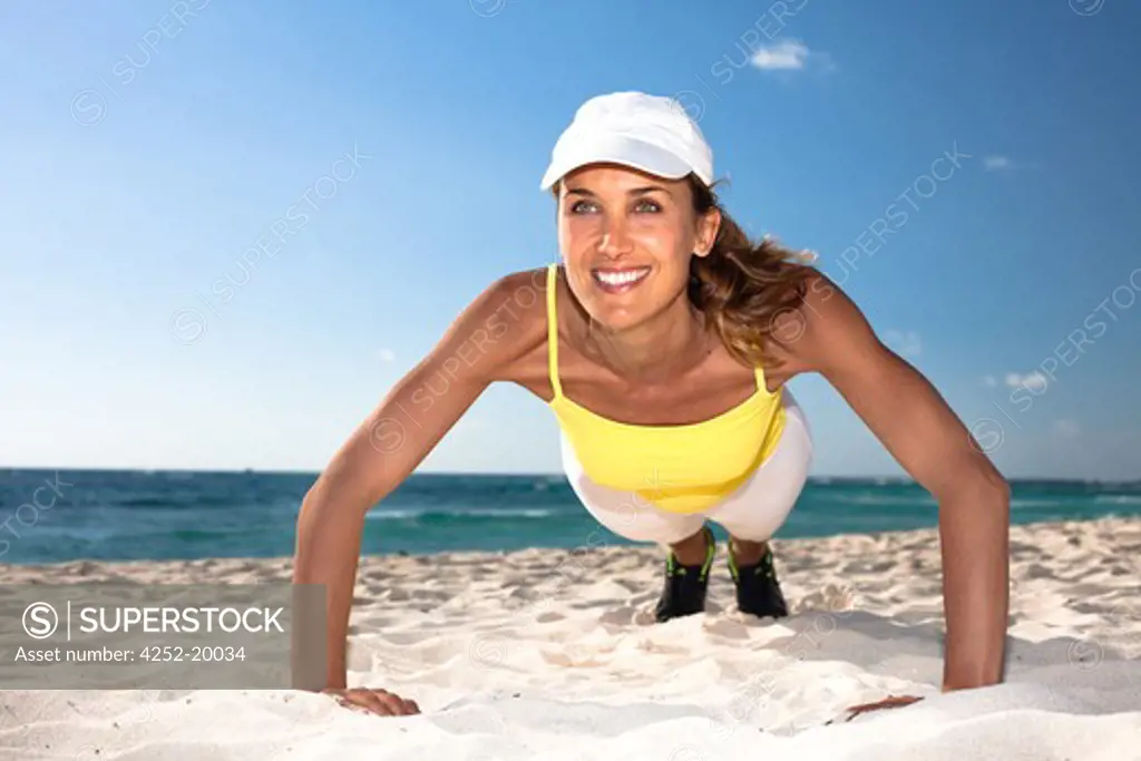 Woman gym push ups