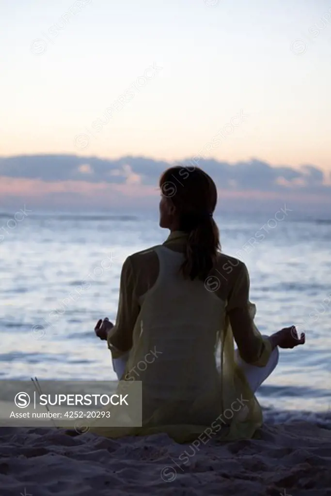 Woman beach yoga