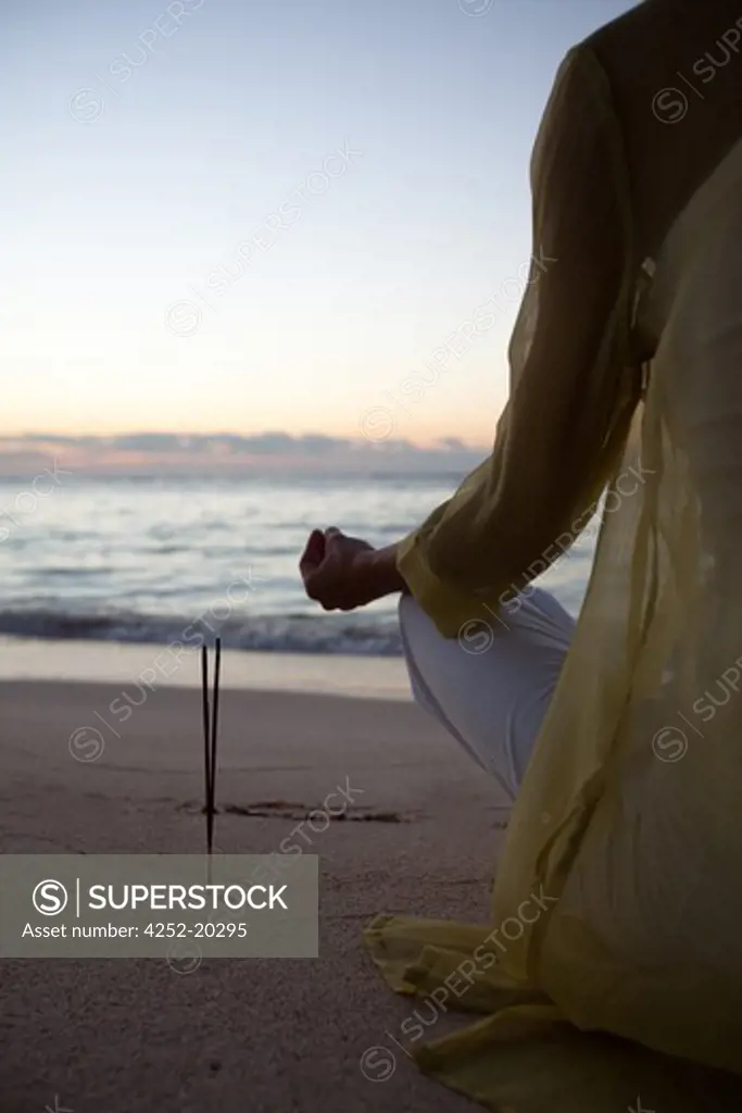 Woman beach yoga