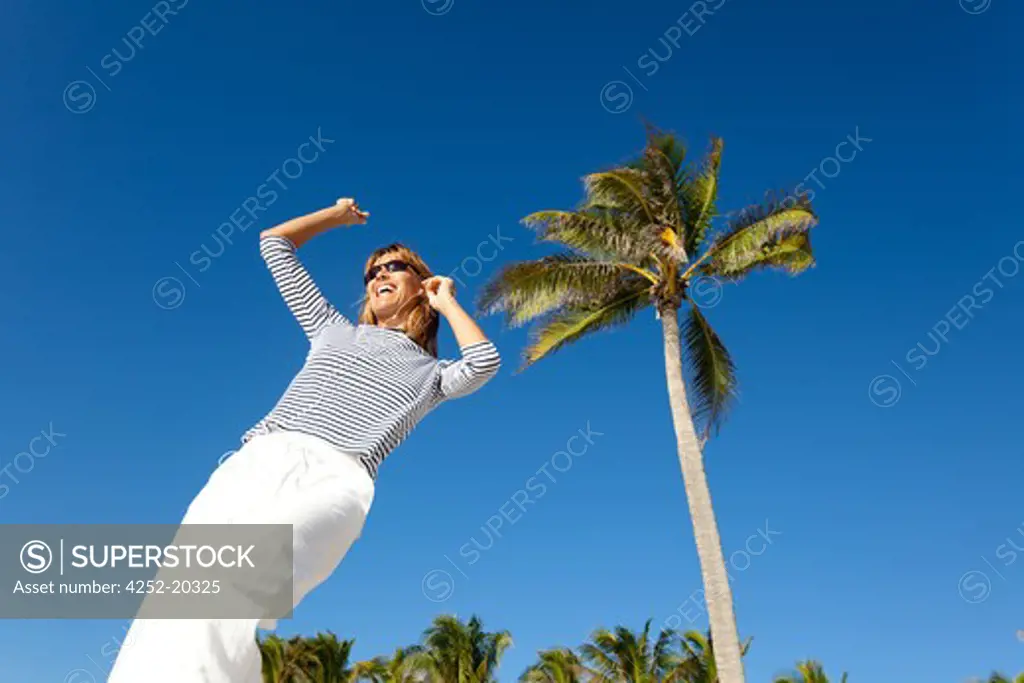 Woman beach dancing