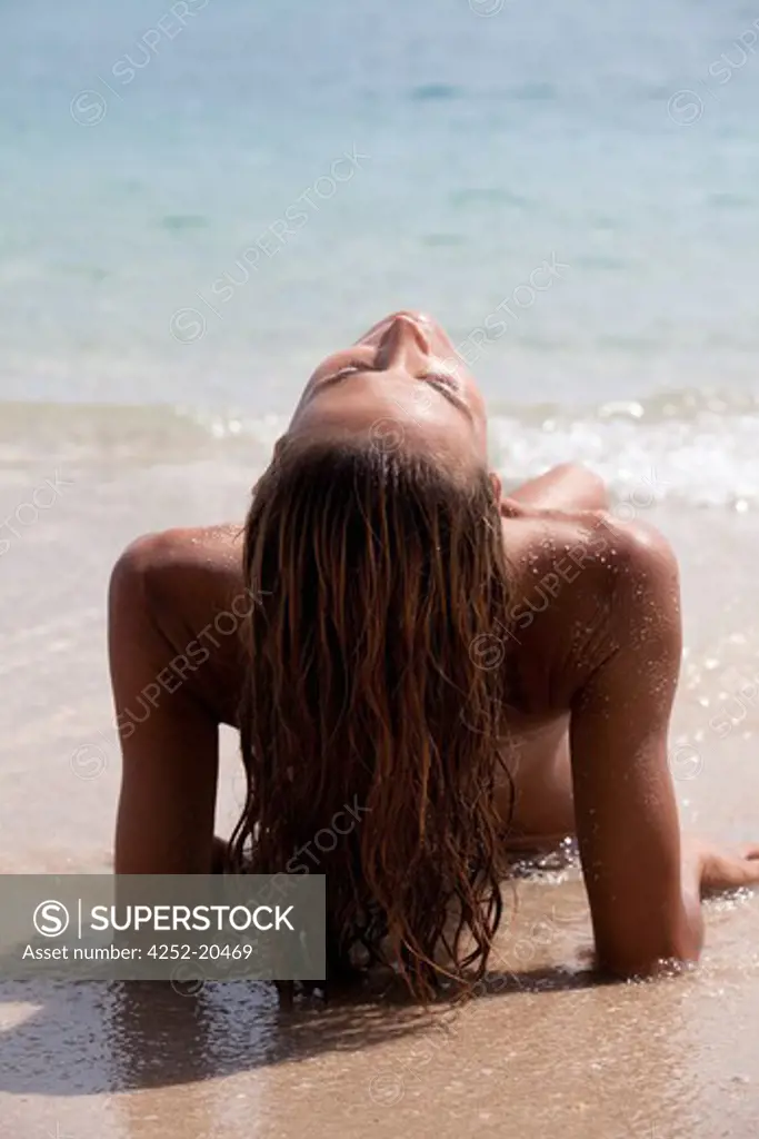 Woman suntan beach