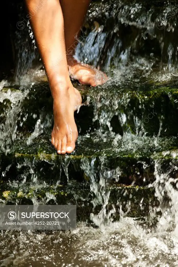 Woman waterfall legs