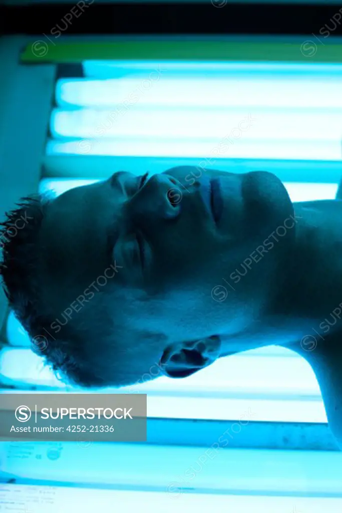 Man UV rays sunbed