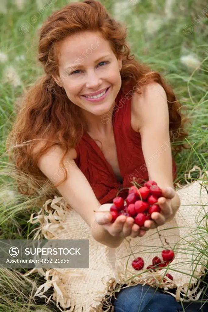 Woman cherries nature