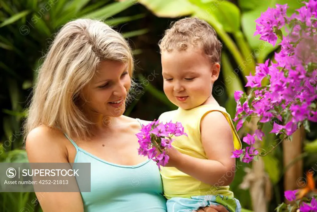 Woman flowers child