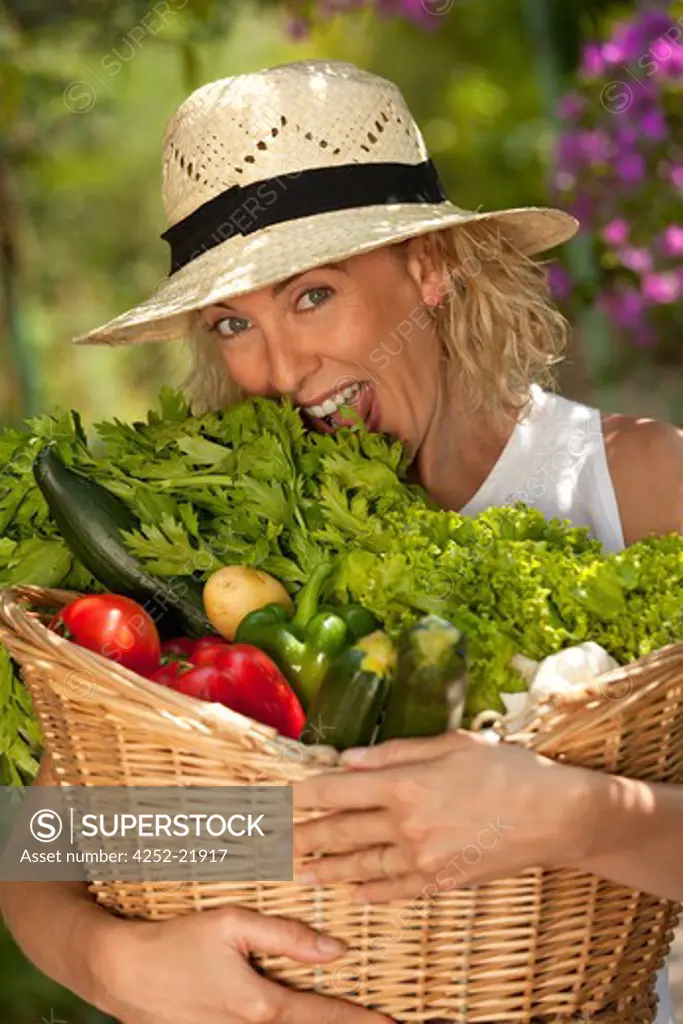 Woman vegetables basket