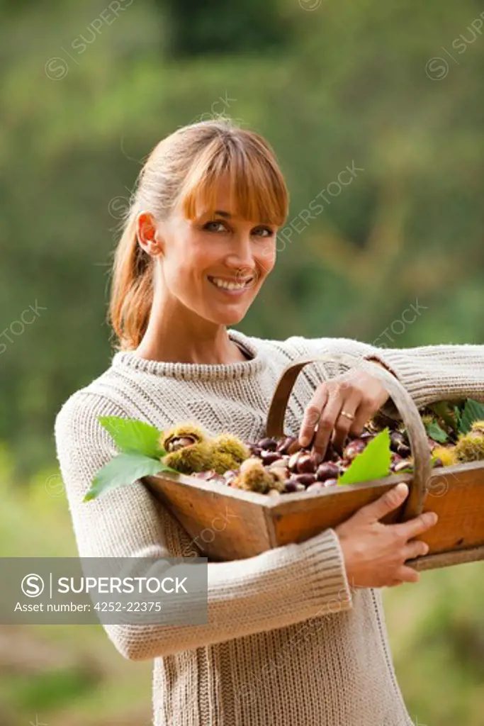 Woman chestnuts basket