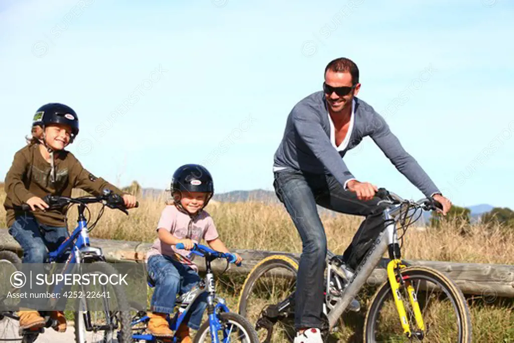 Father children bike