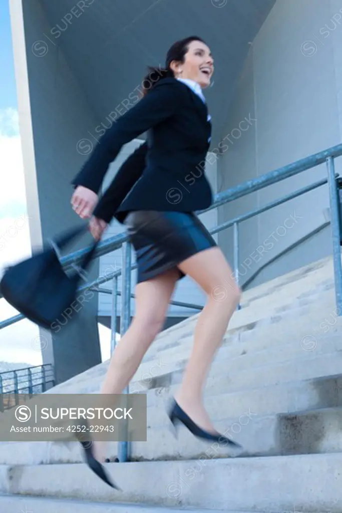 Business woman stairs
