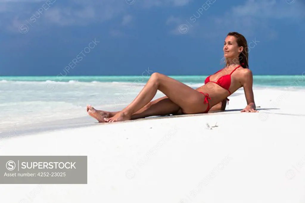Woman suntan beach
